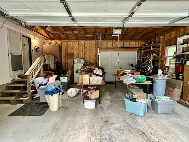 10162 Regimental Way, Grayling, MI 49738 - garage featuring a garage door opener