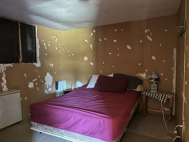 269 Dixson Dr, Grayling, MI 49738 - bedroom with concrete floors