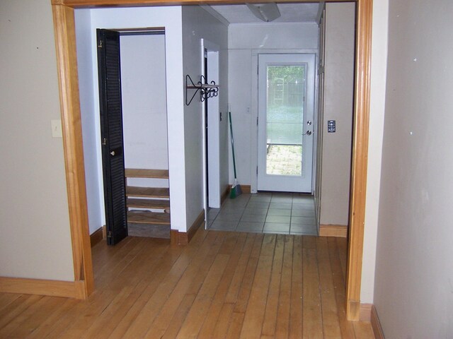 8778 N Townline Rd, Roscommon, MI 48653 - hall featuring hardwood / wood-style floors and baseboards