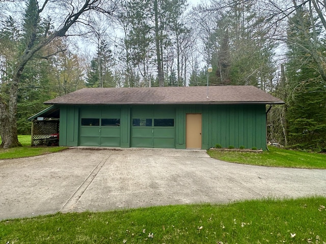 370 W Park Dr, Grayling, MI 49738 - detached garage featuring driveway
