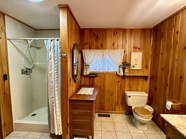 370 W Park Dr, Grayling, MI 49738 - bathroom featuring toilet, a shower with curtain, tile patterned flooring, vanity, and wood walls