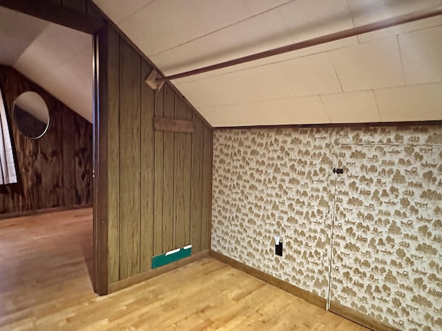 370 W Park Dr, Grayling, MI 49738 - detailed view of wood finished floors, wood walls, and baseboards
