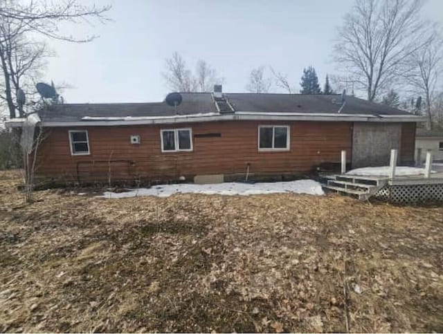 29098 W H 40, Moran, MI 49760 - rear view of house with a wooden deck