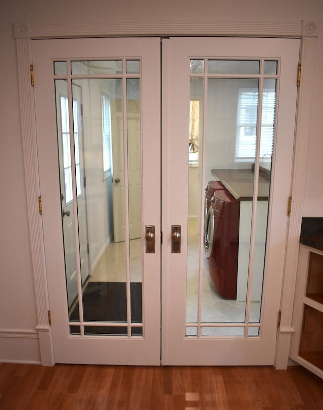 1131 Emmet St, Petoskey, MI 49770 - doorway with wood finished floors and french doors