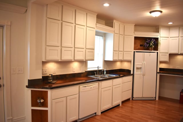 1131 Emmet St, Petoskey, MI 49770 - kitchen with white appliances, a sink, open shelves, white cabinetry, and recessed lighting