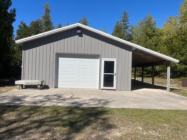 3199 S Lake Shore Dr, Bois Blanc, MI 49775 - garage with a detached garage