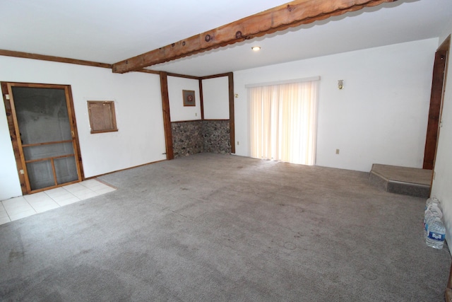 7844 Gilbert Trl, Grayling, MI 49738 - carpeted spare room featuring beamed ceiling