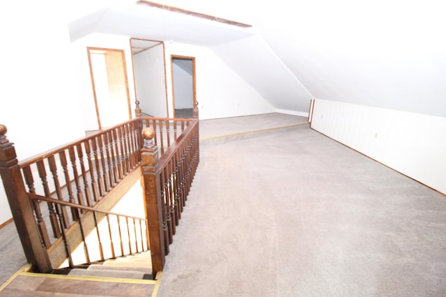 7844 Gilbert Trl, Grayling, MI 49738 - additional living space with vaulted ceiling and carpet floors