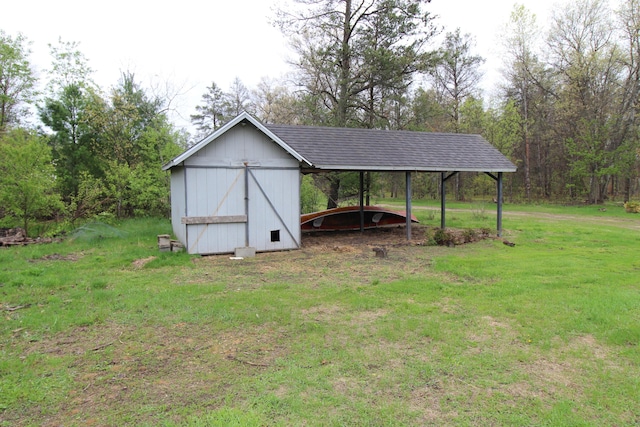 7844 Gilbert Trl, Grayling, MI 49738 - view of outbuilding featuring a detached carport