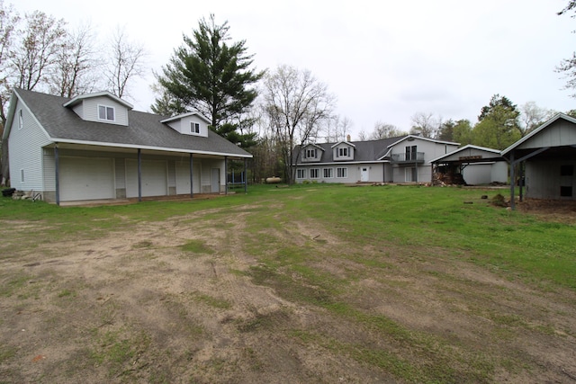 7844 Gilbert Trl, Grayling, MI 49738 - view of grassy yard featuring dirt driveway