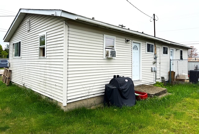 212 Scott St, Grayling, MI 49738 - rear view of house featuring cooling unit
