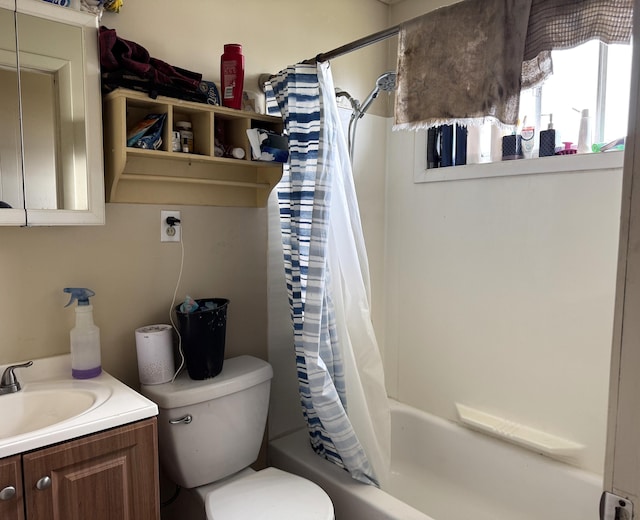 212 Scott St, Grayling, MI 49738 - full bath with vanity, toilet, and shower / bath combo