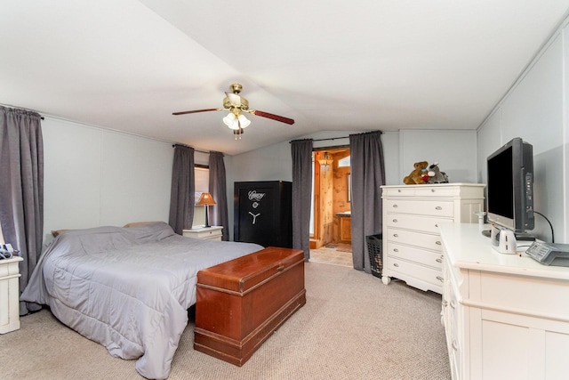 3357 E N Down River Rd, Grayling, MI 49738 - bedroom featuring light carpet, lofted ceiling, ceiling fan, and ensuite bathroom