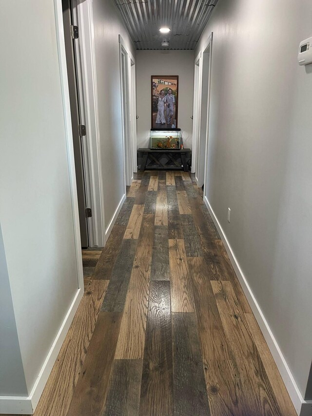 7557 Loop Rd, Posen, MI 49776 - corridor with wood finished floors and baseboards