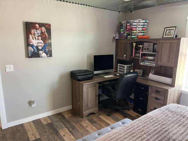 7557 Loop Rd, Posen, MI 49776 - office space featuring baseboards and wood finished floors