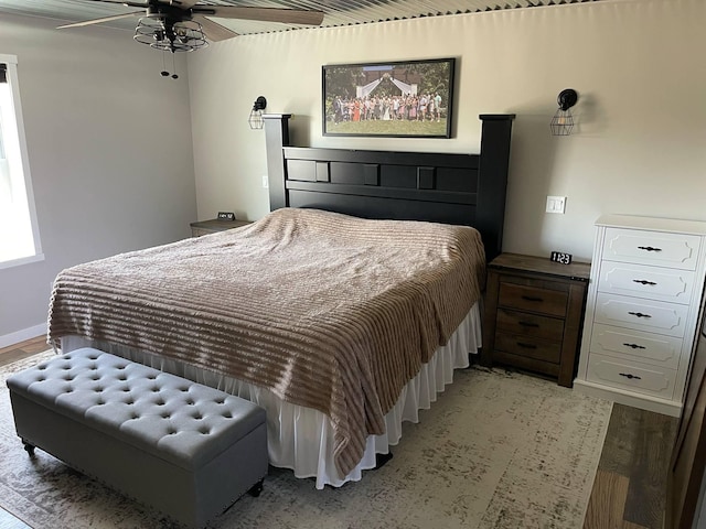 7557 Loop Rd, Posen, MI 49776 - bedroom with light wood-style flooring