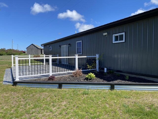 7557 Loop Rd, Posen, MI 49776 - view of rear view of property