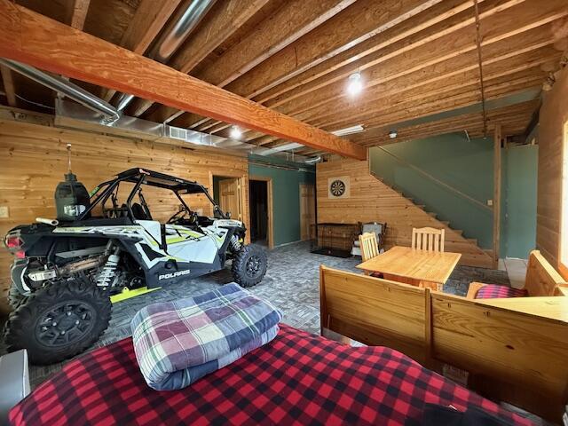 9841 Wheeler Rd, Roscommon, MI 48653 - bedroom with wood walls