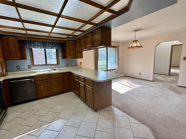 11030 S Stephan Bridge Rd, Roscommon, MI 48653 - kitchen with stainless steel dishwasher, light countertops, a peninsula, a sink, and coffered ceiling