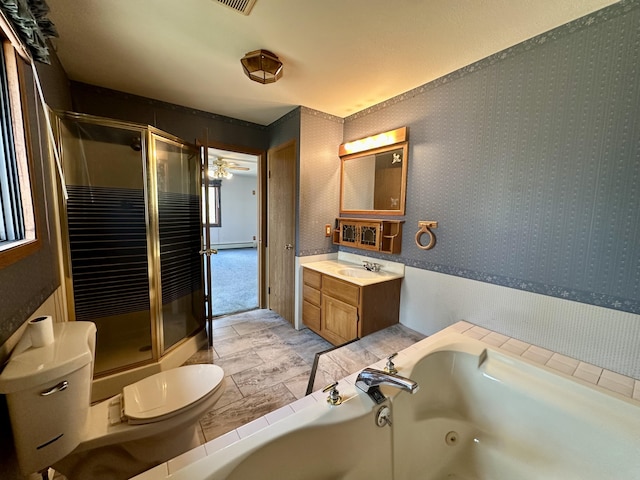 11030 S Stephan Bridge Rd, Roscommon, MI 48653 - full bath with a stall shower, a whirlpool tub, vanity, and toilet
