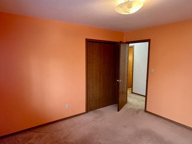11030 S Stephan Bridge Rd, Roscommon, MI 48653 - empty room featuring light carpet and baseboards