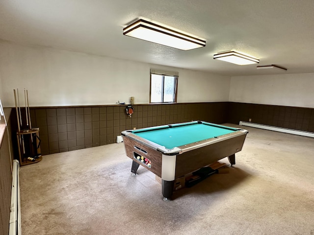 11030 S Stephan Bridge Rd, Roscommon, MI 48653 - game room featuring a baseboard radiator, carpet flooring, pool table, wainscoting, and tile walls