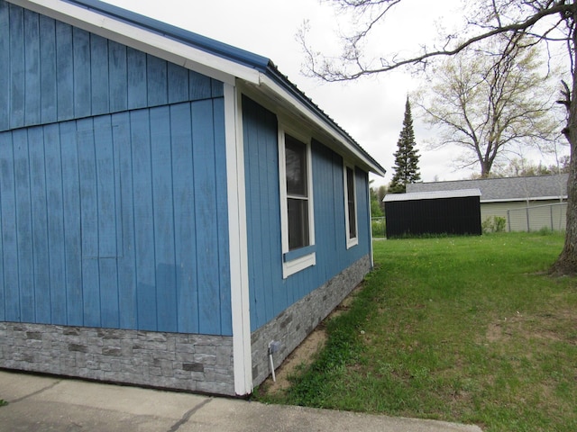 2020 Douglas Dr, Saint Helen, MI 48656 - view of home's exterior with a lawn and crawl space