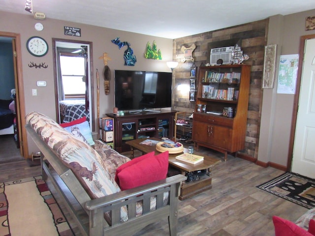 2020 Douglas Dr, Saint Helen, MI 48656 - living room featuring wood finished floors and baseboards