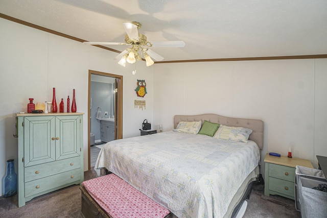 398 Vale St, Cheboygan, MI 49721 - bedroom featuring dark carpet, ornamental molding, ceiling fan, and connected bathroom