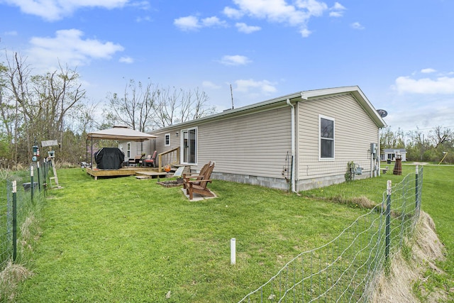 398 Vale St, Cheboygan, MI 49721 - back of house with a wooden deck
