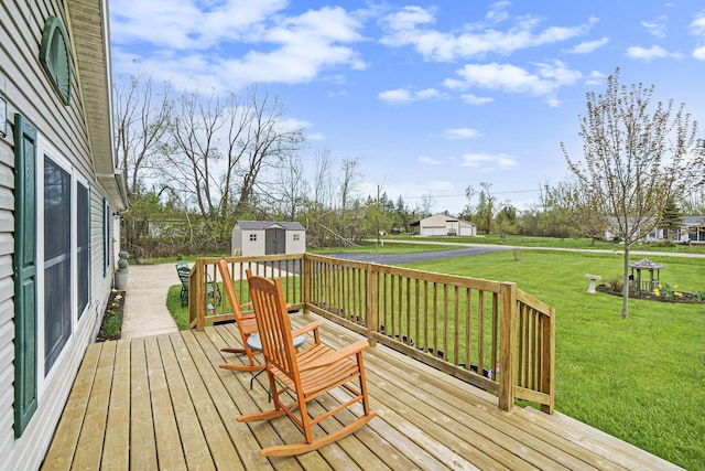 398 Vale St, Cheboygan, MI 49721 - deck featuring a yard