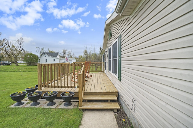 398 Vale St, Cheboygan, MI 49721 - wooden terrace featuring a yard