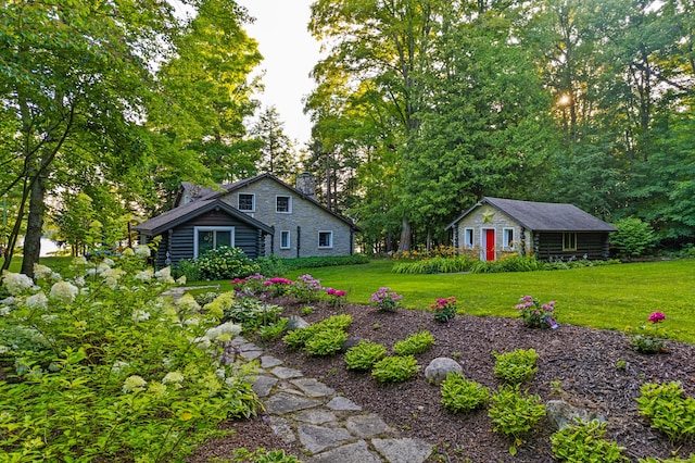 4423 Island View Dr, Gaylord, MI 49735 - view of green lawn featuring an outbuilding