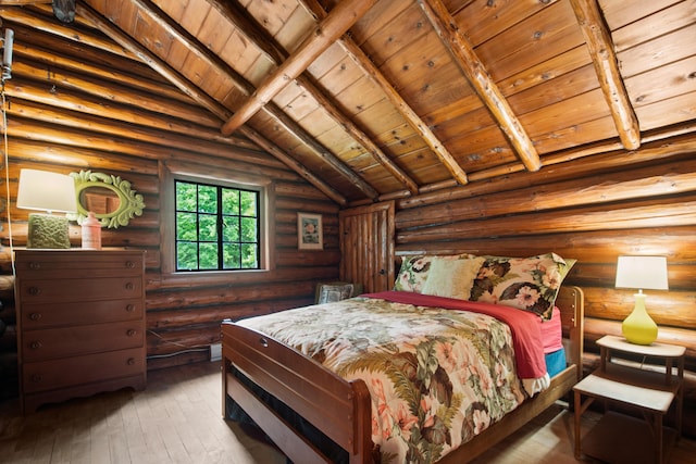 4423 Island View Dr, Gaylord, MI 49735 - bedroom with wooden ceiling, log walls, and hardwood / wood-style flooring