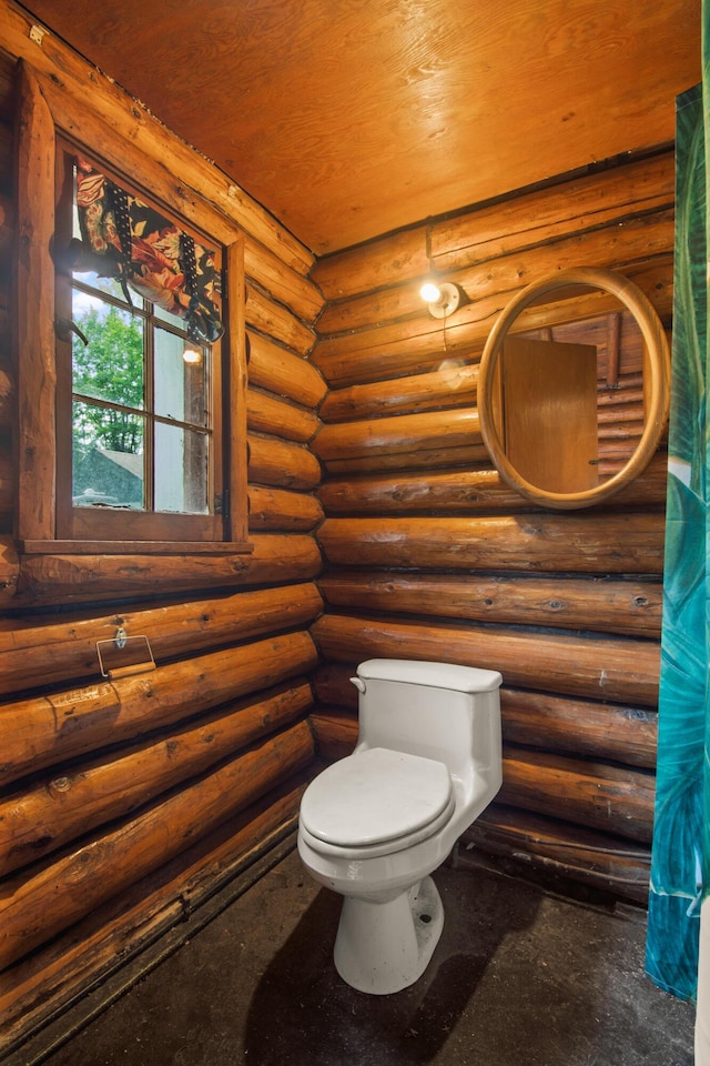 4423 Island View Dr, Gaylord, MI 49735 - bathroom featuring log walls and toilet