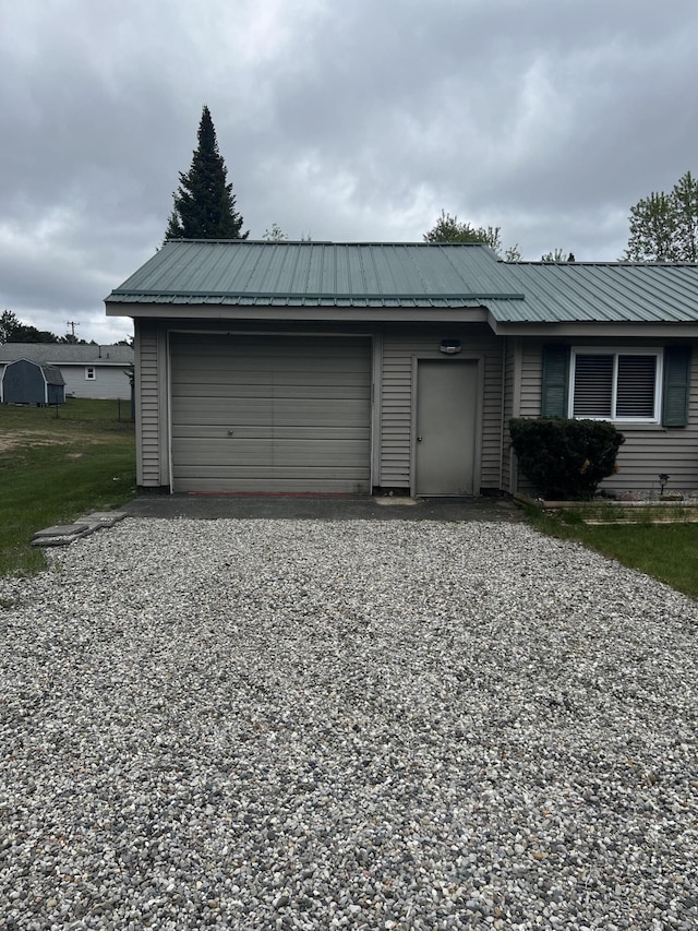 1828 Higgins, Saint Helen, MI 48656 - garage featuring driveway