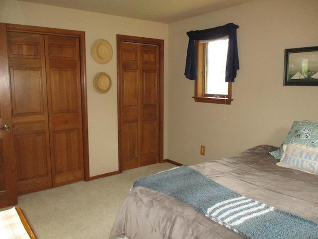 5622 Vacationland Dr, Lewiston, MI 49756 - carpeted bedroom with multiple closets
