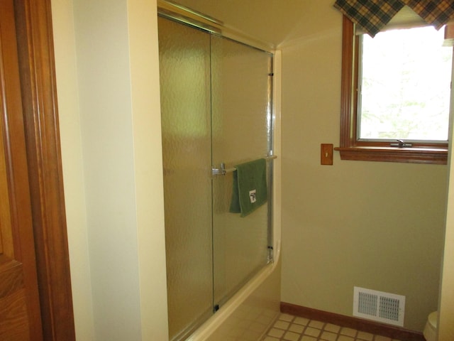 5622 Vacationland Dr, Lewiston, MI 49756 - full bathroom featuring toilet and baseboards