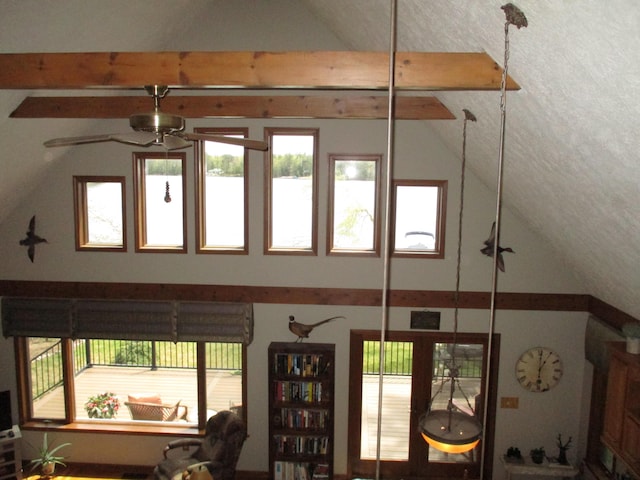 5622 Vacationland Dr, Lewiston, MI 49756 - detailed view of a ceiling fan and beamed ceiling
