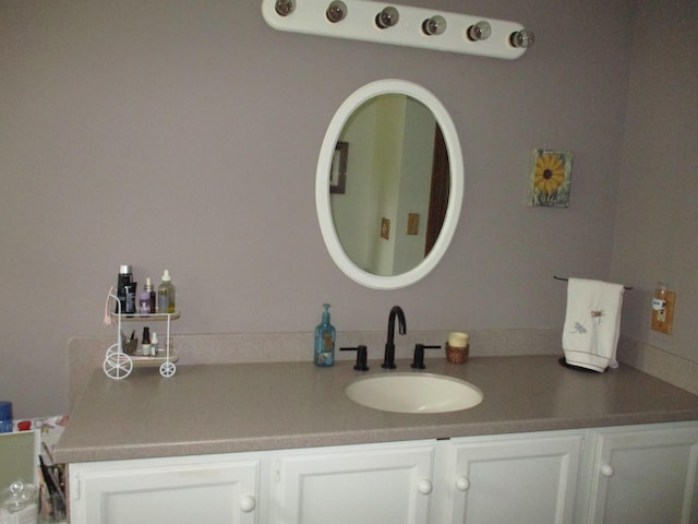 5622 Vacationland Dr, Lewiston, MI 49756 - bathroom featuring vanity