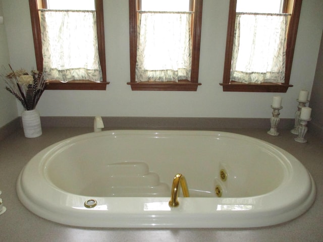 5622 Vacationland Dr, Lewiston, MI 49756 - bathroom with a jetted tub
