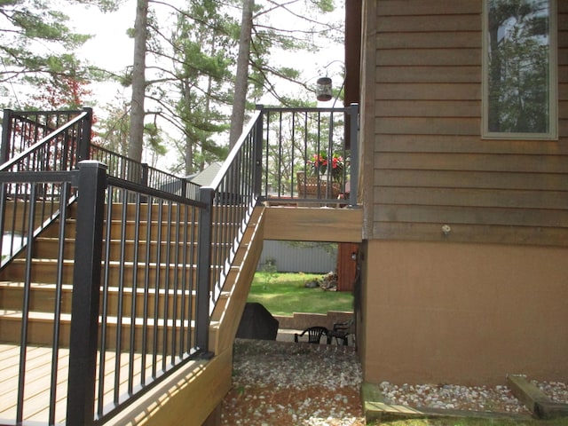 5622 Vacationland Dr, Lewiston, MI 49756 - wooden terrace featuring stairway