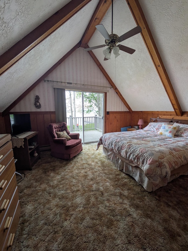 6783 E Houghton Lake Dr, Houghton Lake, MI 48629 - bedroom with access to outside, wood walls, carpet flooring, a textured ceiling, and a baseboard heating unit