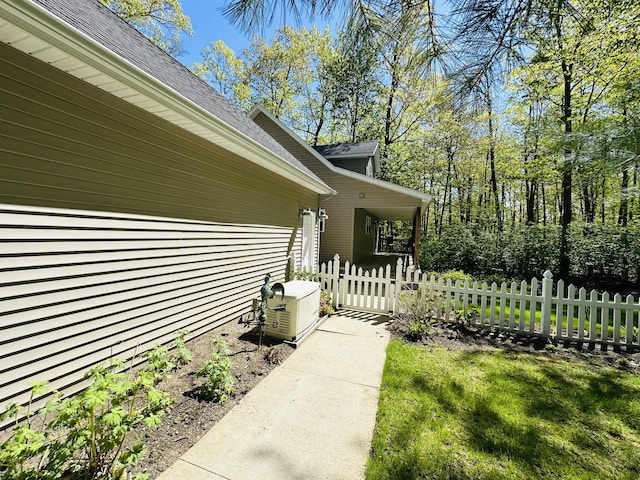240 Monroe Blvd, Roscommon, MI 48653 - view of side of property with a shingled roof