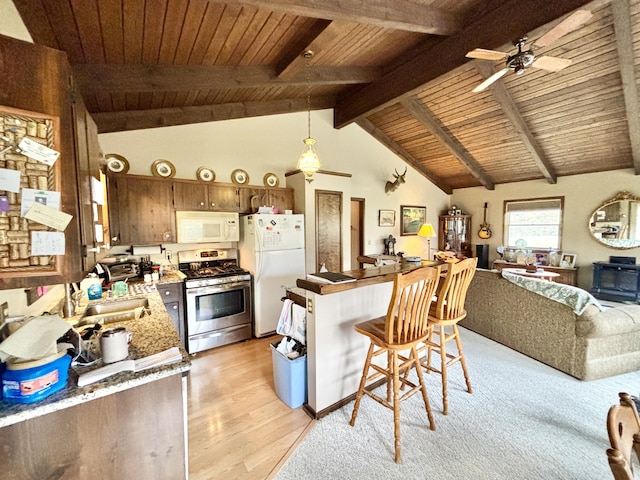 5356 Spruce Dr, Lewiston, MI 49756 - kitchen with white appliances, light wood finished floors, wooden ceiling, ceiling fan, and open floor plan