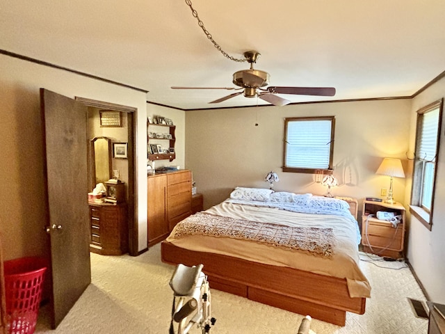 5356 Spruce Dr, Lewiston, MI 49756 - carpeted bedroom featuring crown molding and a ceiling fan