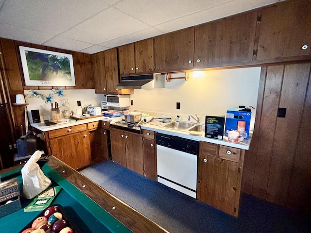 5356 Spruce Dr, Lewiston, MI 49756 - kitchen with dishwasher, under cabinet range hood, light countertops, a sink, and a drop ceiling