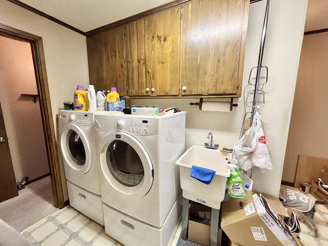 5356 Spruce Dr, Lewiston, MI 49756 - laundry room with cabinet space, independent washer and dryer, and ornamental molding
