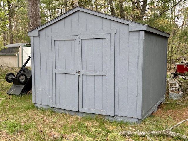 5356 Spruce Dr, Lewiston, MI 49756 - view of shed featuring view of scattered trees