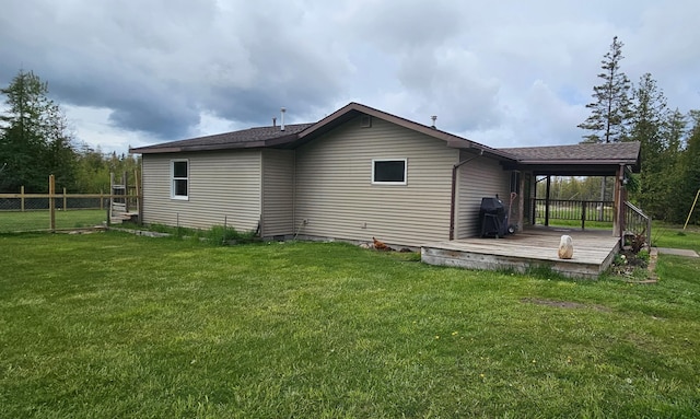 2460 Hamilton Rd, Alpena, MI 49707 - back of house featuring a deck and a shingled roof